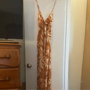 Women’s small tropical floral adjustable maxi dress in desert orange and cream.